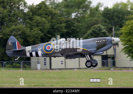 London, UK. 14th June 2014. A Battle of Britain memorial flight Spitfire landing after a display at the Biggin Hill Festival of Flight. London, UK. June 14th 2014 Credit:  Kyle Blunt/Alamy Live News Stock Photo