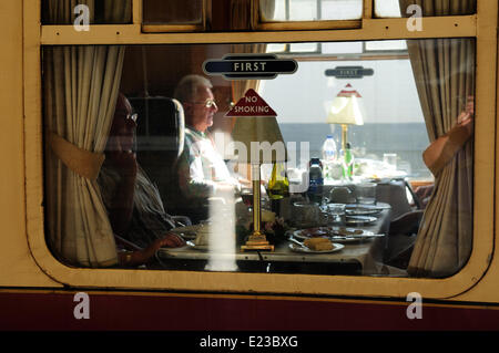 Retford, North Nottinghamshire, UK. 14th June, 2014. Steam engine 34046 Braunton takes on water at Retford station on route from York to London . Credit:  Ian Francis/Alamy Live News Stock Photo