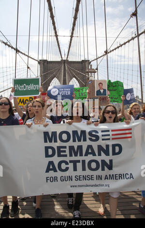 New York, USA. 14th June, 2014. At least a thousand activists joined 'Moms Demand Action' for gun sense in America. They marched across the Brooklyn Bridge and rallied near City Hall to pass meaningful gun legislation and stop the Wild West NRA mentality. Credit:  David Grossman/Alamy Live News