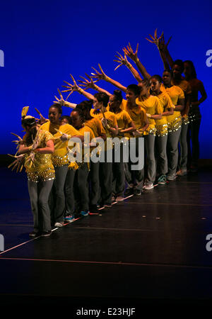 New York, USA. 14th June, 2014. American children from National Dance Institute (NDI) and Chinese children from Shanghai perform Chinese dance together in New York, the United States, on June 14, 2014. NDI held its 2014 signature Event of the Year- Under One Sky: NDI Dances China on Saturday, inviting 24 Chinese children from the program 'Dancing Into the Future: I Can Too,' which has been built in China on the cooperation among NDI, US-China Cultural Institute and several Chinese counterparts since 2011. © Liang Menglong/Xinhua/Alamy Live News Stock Photo