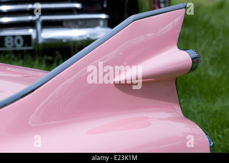 1959 Pink Cadillac. Sharp tail fin with dual bullet tail lights Stock Photo
