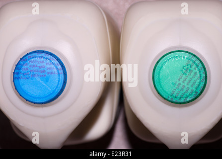 Bottle Tops Of Full Fat and Semi Skimmed Milk Stock Photo