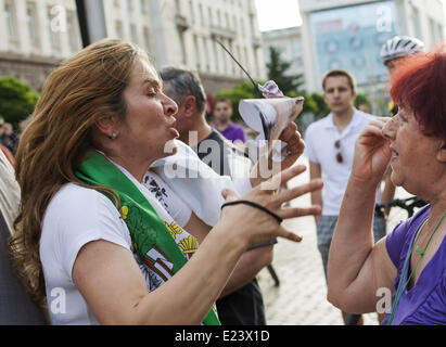 Sofia, Bulgaria. 14th June, 2014. Thousands joined the protest ''DANS no more'' before the National Assembly in Sofia to mark one year since anti-government demonstrations have began in the capital and other Bulgarian cities. The protests started on June 14, 2013 when Delian Peevski was elected President of the State Agency for National Security (DANS) by the Parliament. © Hristo Vladev/NurPhoto/ZUMAPRESS.com/Alamy Live News Stock Photo