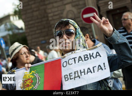 Sofia, Bulgaria. 14th June, 2014. Thousands joined the protest ''DANS no more'' before the National Assembly in Sofia to mark one year since anti-government demonstrations have began in the capital and other Bulgarian cities. The protests started on June 14, 2013 when Delian Peevski was elected President of the State Agency for National Security (DANS) by the Parliament. © Hristo Vladev/NurPhoto/ZUMAPRESS.com/Alamy Live News Stock Photo