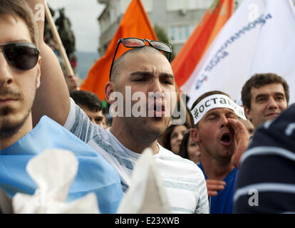 Sofia, Bulgaria. 14th June, 2014. Thousands joined the protest ''DANS no more'' before the National Assembly in Sofia to mark one year since anti-government demonstrations have began in the capital and other Bulgarian cities. The protests started on June 14, 2013 when Delian Peevski was elected President of the State Agency for National Security (DANS) by the Parliament. © Hristo Vladev/NurPhoto/ZUMAPRESS.com/Alamy Live News Stock Photo