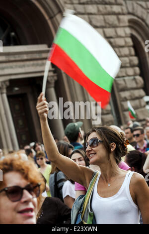 Sofia, Bulgaria. 14th June, 2014. Thousands joined the protest ''DANS no more'' before the National Assembly in Sofia to mark one year since anti-government demonstrations have began in the capital and other Bulgarian cities. The protests started on June 14, 2013 when Delian Peevski was elected President of the State Agency for National Security (DANS) by the Parliament. © Hristo Vladev/NurPhoto/ZUMAPRESS.com/Alamy Live News Stock Photo