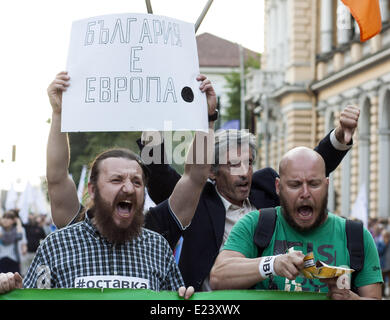 Sofia, Bulgaria. 14th June, 2014. Thousands joined the protest ''DANS no more'' before the National Assembly in Sofia to mark one year since anti-government demonstrations have began in the capital and other Bulgarian cities. The protests started on June 14, 2013 when Delian Peevski was elected President of the State Agency for National Security (DANS) by the Parliament. © Hristo Vladev/NurPhoto/ZUMAPRESS.com/Alamy Live News Stock Photo