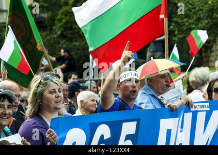 Sofia, Bulgaria. 14th June, 2014. Thousands joined the protest ''DANS no more'' before the National Assembly in Sofia to mark one year since anti-government demonstrations have began in the capital and other Bulgarian cities. The protests started on June 14, 2013 when Delian Peevski was elected President of the State Agency for National Security (DANS) by the Parliament. © Hristo Vladev/NurPhoto/ZUMAPRESS.com/Alamy Live News Stock Photo