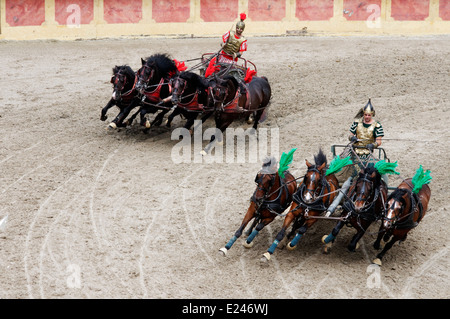 Re-enactment of a Roman chariot race at Puy du Fou in Les Epesses, Vendee, France Stock Photo