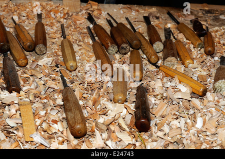 Chisels in sawdust and wood shavings Stock Photo
