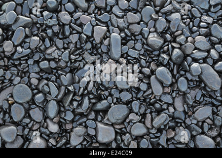 Wet black pebbles Stock Photo