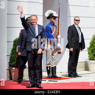 Bratislava, Sunday. 15th June, 2014. New Slovak President Andrej Kiska, left, waves to the crowd as he arrive at Presidential Palace in Bratislava, Sunday, June 15, 2014. Kiska is the fourth head of state since the establishment of independent Slovakia in 1993. Credit:  Jan Koller/CTK Photo/Alamy Live News Stock Photo