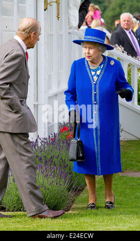 London, UK. 14th June, 2014.Britain's Queen Elizabeth II and Prince Philip, Duke of Edinburgh attending The Queens Polo Cup near Windsor on Sunday 15 June 2014. Credit:  dpa picture alliance/Alamy Live News Stock Photo