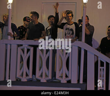 One Direction wave to fans on a balcony in Miami Miami Beach,  Where: Florida, Florida, United States When: 13 Jun 2013 Stock Photo