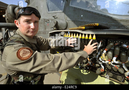 Previously unissued picture of Corporal Graham Carr arming loading ...