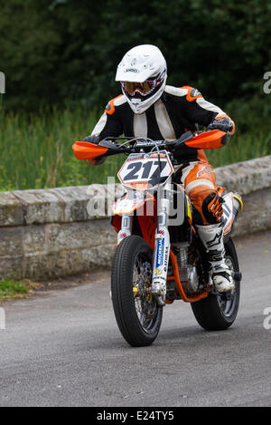 No.217 KTM 450 Richard Sharp at the Cholmondeley Pageant of Power. The action is at the 1.2-mile track within the park grounds of Cholmondeley Castle where bikes compete in a time trial, spanning seven decades of motorsports. The weekend is one of the biggest celebrations of power and speed in the country. Stock Photo