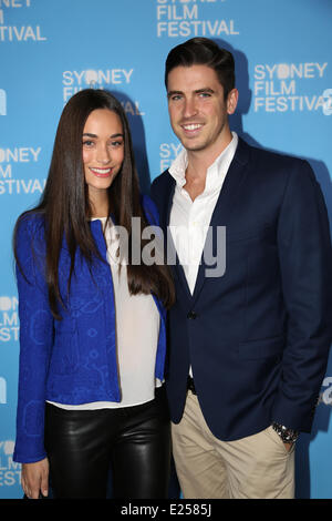 Sydney, Australia. 15th June, 2014. Scott Tweedie and his model gitlfriend, Georgia Berg arrive on the red carpet at the State Theatre for the Australian premiere of New Zealand vampire mockumentary ‘What We Do in the Shadows’ at the Sydney Film Festival closing night. Copyright Credit:  2014 Richard Milnes/Alamy Live News Stock Photo