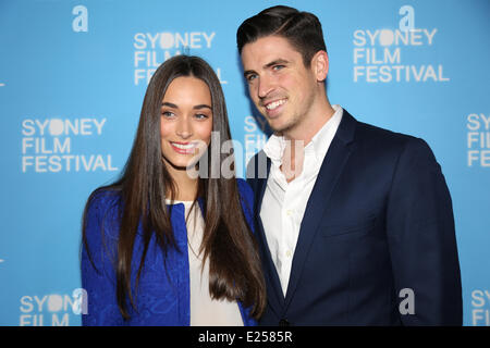 Sydney, Australia. 15th June, 2014. Scott Tweedie and his model gitlfriend, Georgia Berg arrive on the red carpet at the State Theatre for the Australian premiere of New Zealand vampire mockumentary ‘What We Do in the Shadows’ at the Sydney Film Festival closing night. Copyright Credit:  2014 Richard Milnes/Alamy Live News Stock Photo