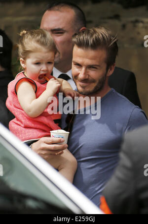 David and Victoria Beckham take their children to visit the Eiffel Tower. After dining at Jules Vernes restaurant within the tower they went on to visit Musee du quai Branly  Featuring: David Beckham,Harper Beckham Where: Paris, France When: 05 May 2013 Stock Photo