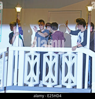 One Direction wave to fans on a balcony in Miami  Featuring: Niall Horan,Liam Payne,Louis Tomlinson,Harry Styles,One Direction Where: Miami, Florida, United States When: 14 Jun 2013 Stock Photo