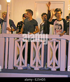 One Direction wave to fans on a balcony in Miami  Featuring: Niall Horan,Liam Payne,Louis Tomlinson,Harry Styles,One Direction Where: Miami, Florida, United States When: 14 Jun 2013 Stock Photo