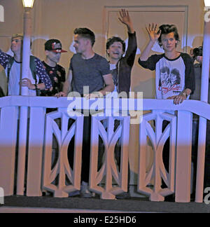 One Direction wave to fans on a balcony in Miami  Featuring: Niall Horan,Liam Payne,Louis Tomlinson,Harry Styles,One Direction Where: Miami, Florida, United States When: 14 Jun 2013 Stock Photo