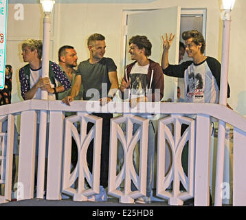 One Direction wave to fans on a balcony in Miami  Featuring: Niall Horan,Liam Payne,Louis Tomlinson,Harry Styles,One Direction Where: Miami, Florida, United States When: 14 Jun 2013 Stock Photo