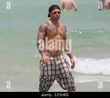 Duncan James and Lee Ryan from Blue on holiday at Nikki Beach resort on Miami Beach  Featuring: Duncan James Where: Miami, Florida, United States When: 25 Jun 2013 Stock Photo