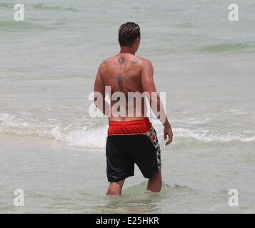 Duncan James and Lee Ryan from Blue on holiday at Nikki Beach resort on Miami Beach  Featuring: Lee Ryan Where: Miami, Florida, United States When: 25 Jun 2013 Stock Photo