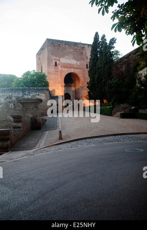 Night time illuminated view of the Puerta de la Justicia, Gate of Justice, entrance tower to the Alhambra, Granada, Spain Stock Photo