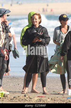 Helen Hunt filming and directing her new movie 'Ride' on Venice Beach. The film is about a mother who travels cross-country to California to be with her son after he decides to drop out of school and become a surfer.  Where: Los Angeles, Colifornia, United States When: 08 Aug 2013 Stock Photo