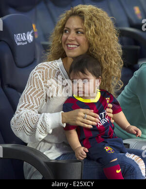 Shakira, along with her baby son and mother-in-law, watch her partner Gerard Pique in an FC Barcelona football match against Sevilla FC  Featuring: Shakira,Milan Pique Mebarak Where: Barcelona, Spain When: 14 Sep 2013 Stock Photo