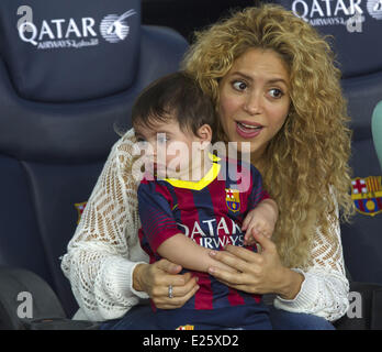 Shakira, along with her baby son and mother-in-law, watch her partner Gerard Pique in an FC Barcelona football match against Sevilla FC  Featuring: Shakira,Milan Pique Mebarak Where: Barcelona, Spain When: 14 Sep 2013 Stock Photo