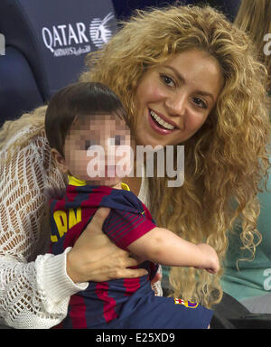 Shakira, along with her baby son and mother-in-law, watch her partner Gerard Pique in an FC Barcelona football match against Sevilla FC  Featuring: Shakira,Milan Pique Mebarak Where: Barcelona, Spain When: 14 Sep 2013 Stock Photo