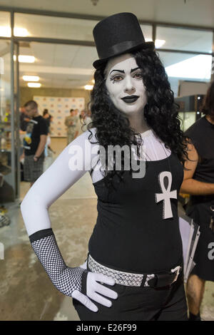 Garden City, New York, USA. 14th June, 2014. ADRIENNE LOJECK, of Port Jefferson, is dressed in black and white as Death from Sandman comic books by Neil gaiman, at Eternal Con, the annual Pop Culture Expo, held at the Cradle of Aviation Museum on Long Island. A white ankh, a symbol for life, is on her shirt. Credit:  Ann E Parry/Alamy Live News Stock Photo