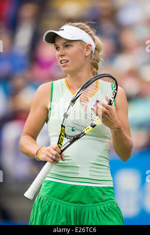 Eastbourne, UK. 16th June, 2014. Caroline Wozniacki of Denmark adjusts her strings in her singles match on Day One of the Aegon International at Devonshire Park, Eastbourne. Credit:  MeonStock/Alamy Live News Stock Photo