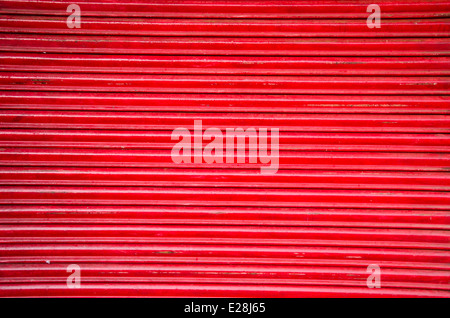 red market metal corrugated door abstract background and texture Stock Photo