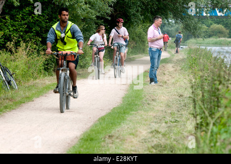 Cambridge May Bumps, cyclists on River Cam towpath Stock Photo