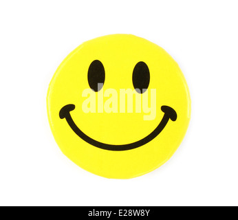 Yellow happy face pin on white background Stock Photo