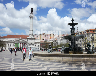 Fountain in Rossio Square, Lisbon, Portugal. The Column of Pedro IV is in the middle of the square. Stock Photo