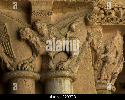 France.  Figures carved on capital of column in the cloister next to the Abbaye Saint Pierre, Moissac. All tell a story. Stock Photo