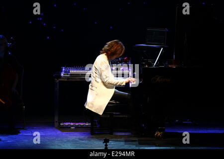 Taipei, China. 14th June, 2014. Japanese singer Yoshiki performs at the stage at his concert in Taipei, China on Saturday June 14, 2014. © TopPhoto/Alamy Live News Stock Photo