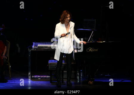 Taipei, China. 14th June, 2014. Japanese singer Yoshiki performs at the stage at his concert in Taipei, China on Saturday June 14, 2014. © TopPhoto/Alamy Live News Stock Photo