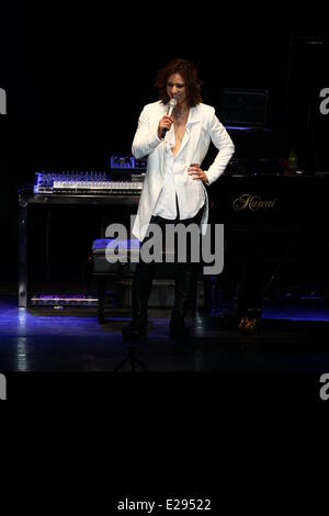 Taipei, China. 14th June, 2014. Japanese singer Yoshiki performs at the stage at his concert in Taipei, China on Saturday June 14, 2014. © TopPhoto/Alamy Live News Stock Photo