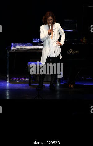 Taipei, China. 14th June, 2014. Japanese singer Yoshiki performs at the stage at his concert in Taipei, China on Saturday June 14, 2014. © TopPhoto/Alamy Live News Stock Photo