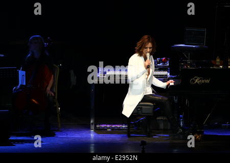 Taipei, China. 14th June, 2014. Japanese singer Yoshiki performs at the stage at his concert in Taipei, China on Saturday June 14, 2014. © TopPhoto/Alamy Live News Stock Photo