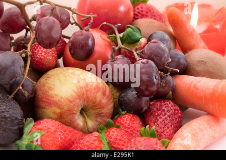 Fruits and candle Stock Photo