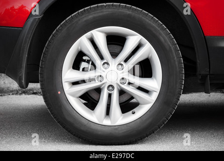 Modern automotive wheel on alloy disc Stock Photo