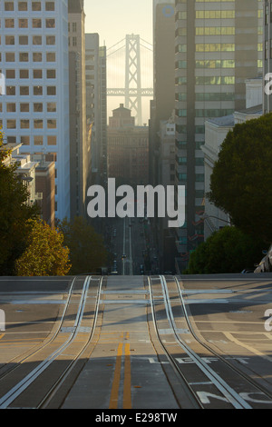 California Street cable car line leading to the San Francisco - Oakland Bay Bridge in San Francisco, California Stock Photo