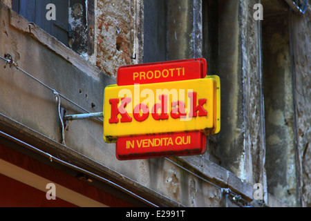 Venice, Prodotti, in vendetta, Kodak, street sign. Old  advertising sign fixed to a wall in back streets of Venice Italy, St Marks, San Marco, film. Stock Photo